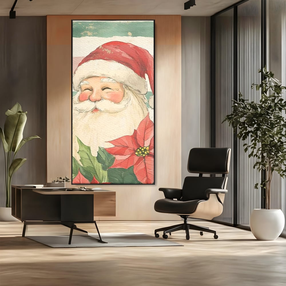 Tablou canvas cu portret ilustrativ cu mos craciun, in rama de aluminiu negru, pe perete intr-un birou